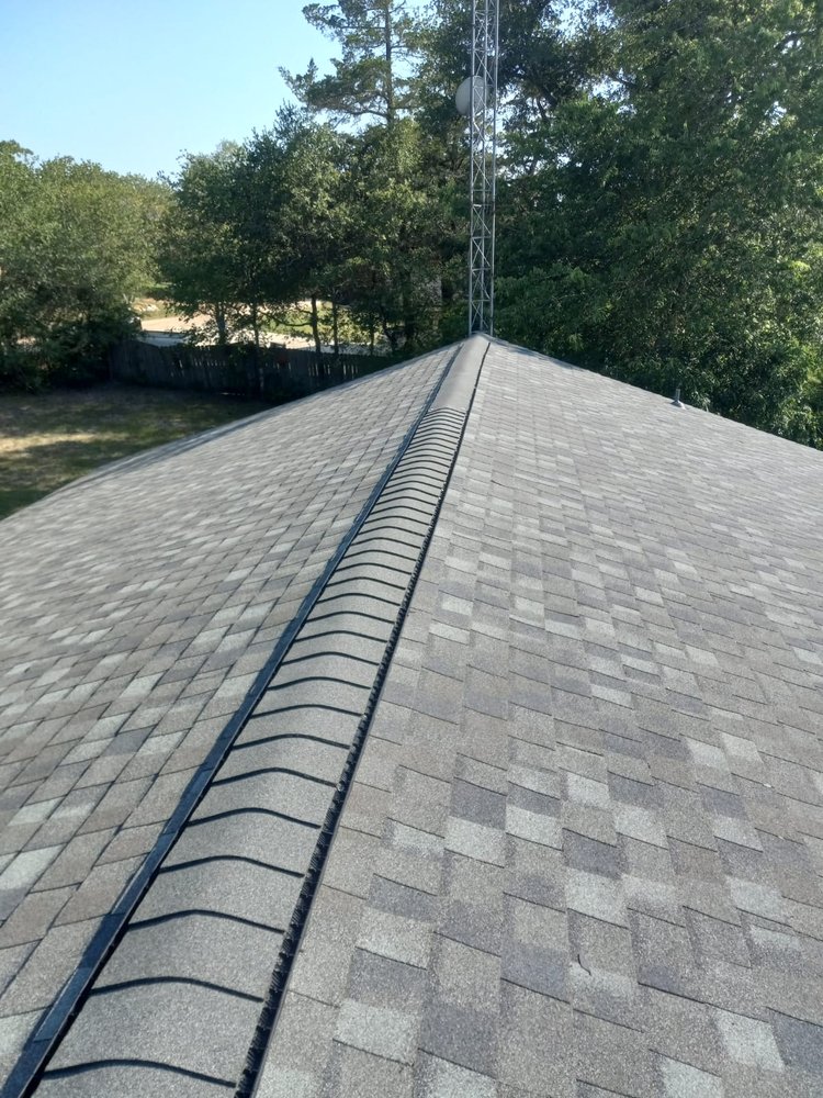 Slide of Truly Roofing & Construction