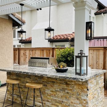 Dream Green Landscape - Large BBQ island with granite top and honey good ledger stone walls, Angelus pavers - courtyard, sandstone mocha. - Landscaping Near Me - Thousand Oaks, California