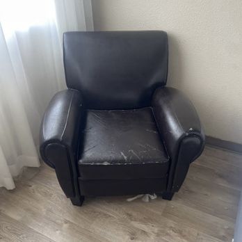 Emerald Beach Hotel - Messed up chair that hurt when you sat in it - Hotels Near Me - Corpus Christi, Texas