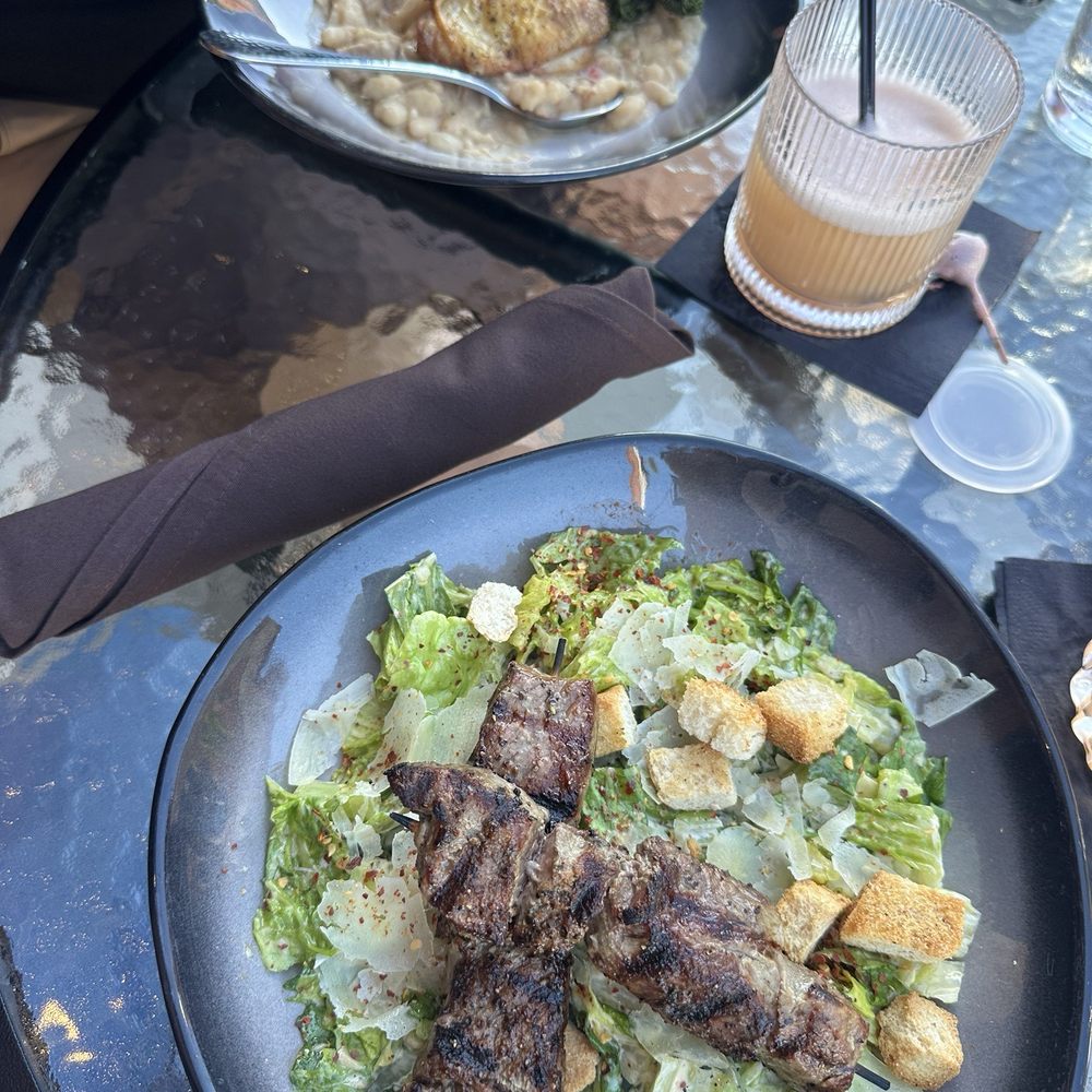 113 Main - Chicken thigh and Calabrian Caesar with steak - Cocktail Bars Near Me - Sandpoint, Idaho