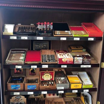 Grand Liquor - shelves of cigars and cigars - Beer, Wine & Spirits Near Me - Orlando, Florida Grand Liquor - shelves of cigars and cigars - Beer, Wine & Spirits Near Me - Orlando, Florida