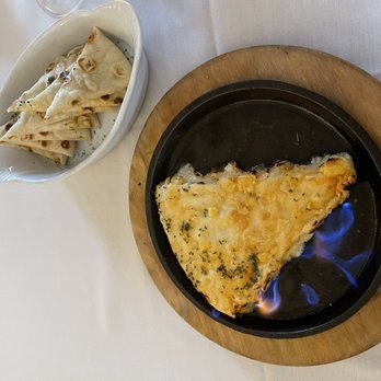 Paros Estiatorio - SAGANAKI crispy kefalograviera cheese, lemon, oregano - Greek Near Me - Overland Park, Kansas