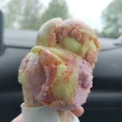 Scoops - Small scoop rainbow sherbet on a sugar cone. 5/2026.