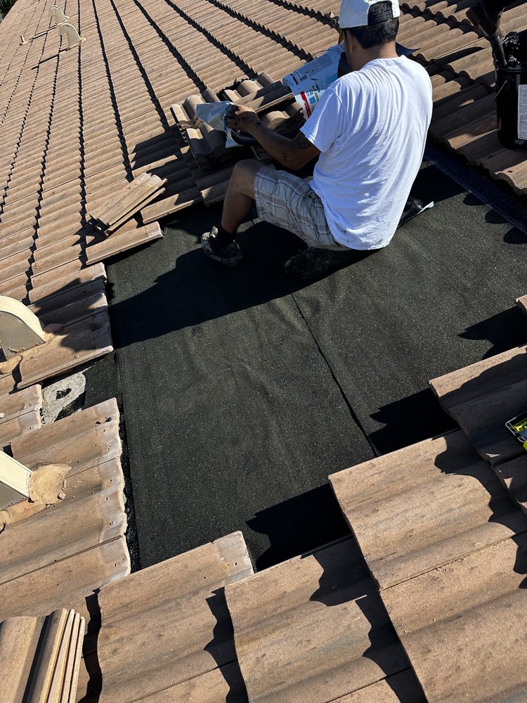 Slide of Tropical Roofing Services