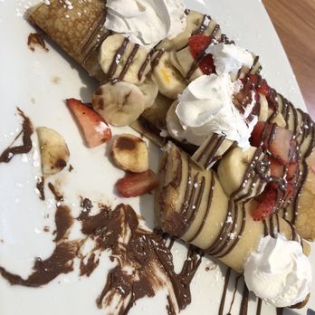 Broken Yolk Cafe - Nutella Crepes with added fruit - Breakfast & Brunch Near Me - Irvine, California Broken Yolk Cafe - Nutella Crepes with added fruit - Breakfast & Brunch Near Me - Irvine, California
