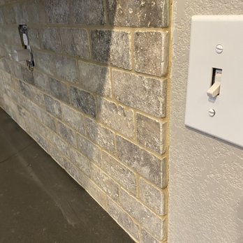Architectural Stone - Poorly finish edge and irregular grout lines. - General Contractors Near Me - Byron, California