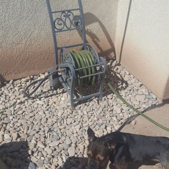 Wild West Landscaping - They built a nice little area to keep my water hose, the dog approves! - Landscaping Near Me Wild West Landscaping - They built a nice little area to keep my water hose, the dog approves! - Landscaping Near Me