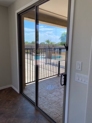 Chandler Window Washing June 2022 - This home in Chandler has an amazing view and all it needed was some clean windows to bring it back to life! Their backyard now looks stunning and the window tracks are gunk free.