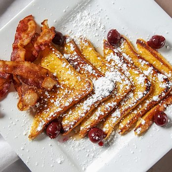 Jamerican Kitchen Cafe - French toast with a side of bacon. - Caribbean Near Me - Beachwood, Ohio Jamerican Kitchen Cafe - French toast with a side of bacon. - Caribbean Near Me - Beachwood, Ohio