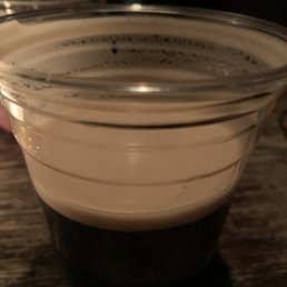 a cup of coffee on a table