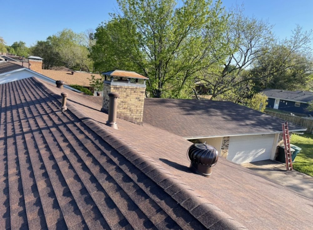 Slide of Homer’s Roofing & Construction