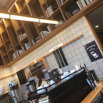 Commonwealth Joe - Book shelves above the barista area - Cafes Near Me - Arlington, Virginia Commonwealth Joe - Book shelves above the barista area - Cafes Near Me - Arlington, Virginia