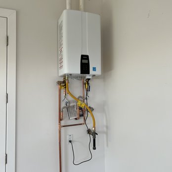VZ Plumbing - In home, vented, tankless water heater installation. - Plumbing Near Me