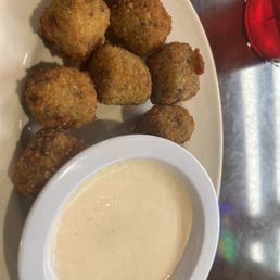 Boudin bits with Tiger sauce