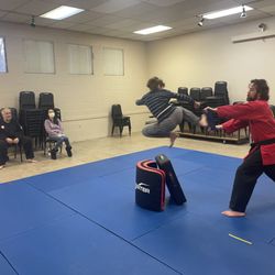 Jumping side kick! Showing off those blackbelt skills