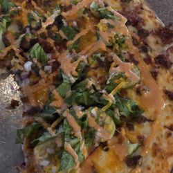 Geno's Grill - Pizza of the month is The Burger Bomb