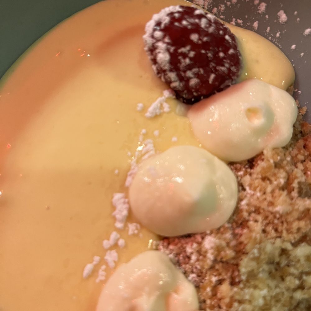 The Continental - Passionfruit creme with mascarpone cream, crumb, and raspberry. - French Near Me - Calgary, Alberta The Continental - Passionfruit creme with mascarpone cream, crumb, and raspberry. - French Near Me - Calgary, Alberta