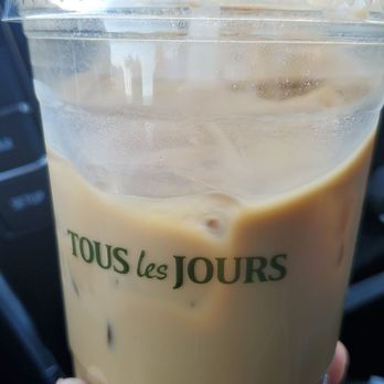 Tous Les Jours - Hazelnut latte with oatmilk. I asked for hot though‍ but I was already late for work to fix it - Bakeries Near Me - Cerritos, California