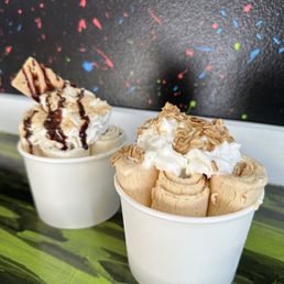 two cups of ice cream with toppings
