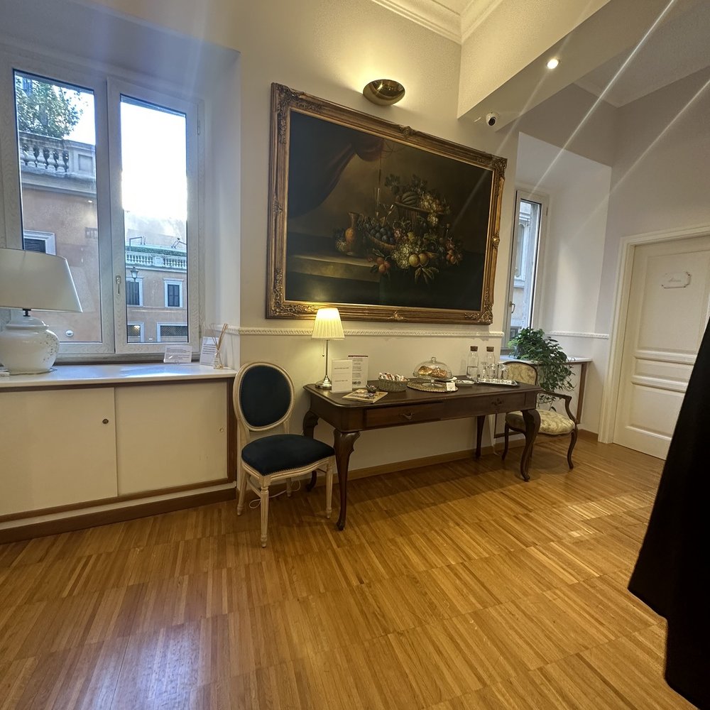 I Tre Moschettieri, Guest House - Reception area of our floor where you can have the free croissants and where they serve breakfast I believe. - Bed & Breakfast Near Me - Rome, RM