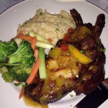 Polaris Grill - Pork chops looked better than they actually were. Great cheese grits though! - New American Near Me - Columbus, Ohio