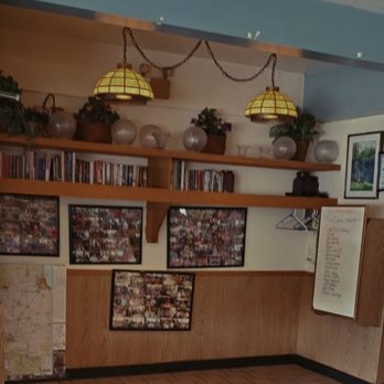 Nikarry's Restaurant - Book nook as you enter the restaurant - American Near Me - Aurora, Illinois Nikarry's Restaurant - Book nook as you enter the restaurant - American Near Me - Aurora, Illinois