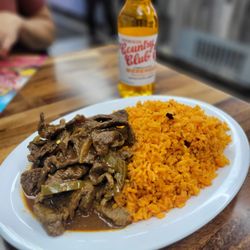 Gallego Seafood - Herring rice and beef guisado