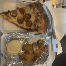 Pepperoni pizza and lemon pepper wings. Pepperoni pizza and lemon pepper wings.