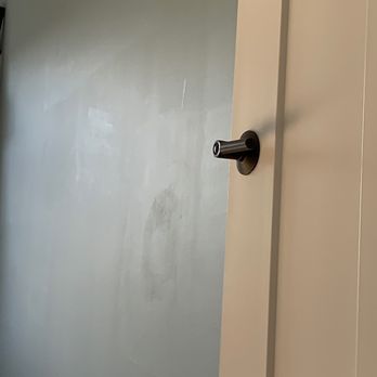 Touch Of Paint - Patches left behind on the wall. - Painters Near Me