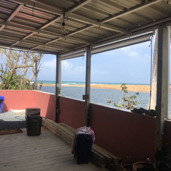 Casa Coral - Unfiltered view of beach from porch/open kitchen of Casa Coral.  This space is all time. - Hostels Near Me - Luquillo, Puerto Rico
