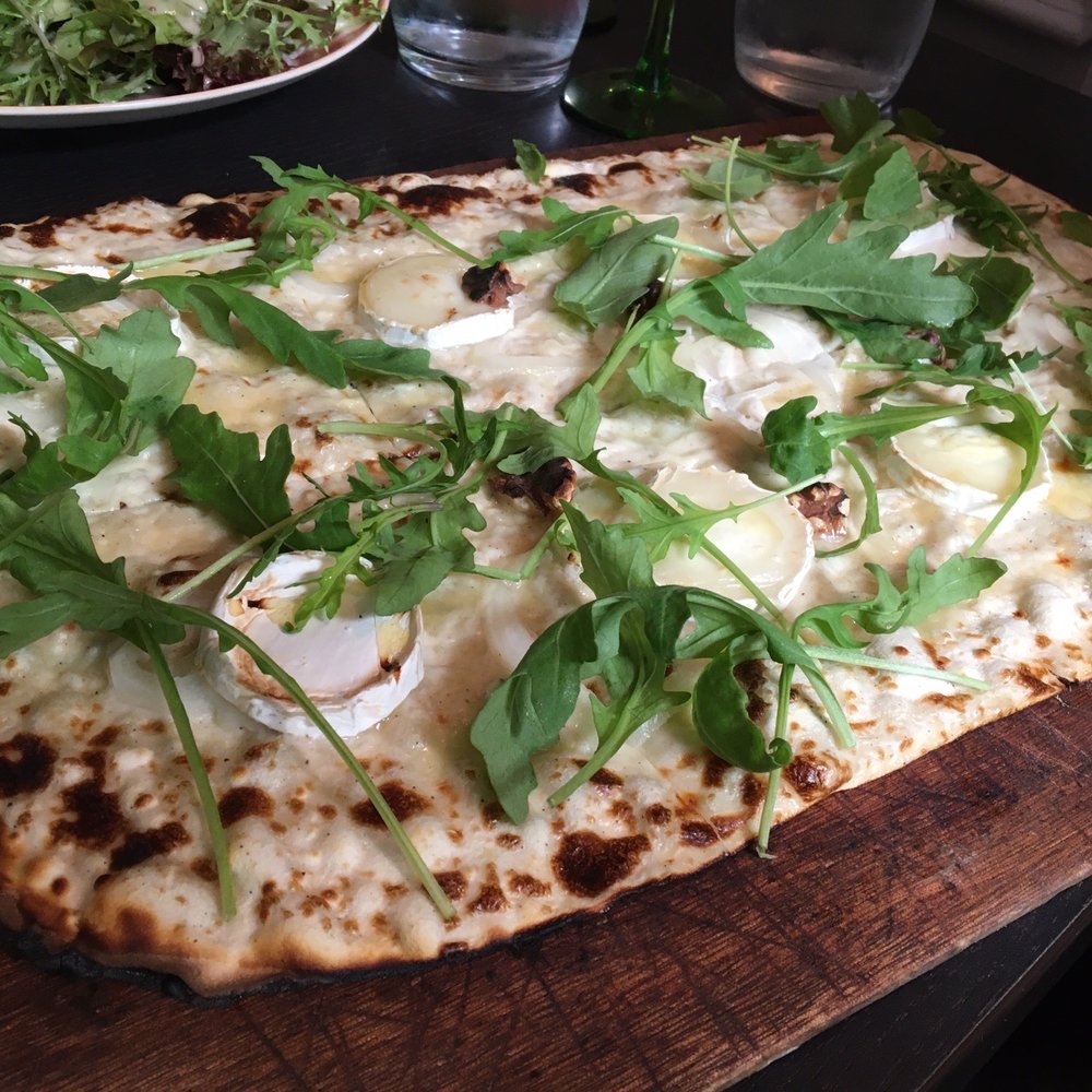 La Fignette - Goat cheese and onion " Alsatian pizza".  This type of crust/ bread is a local specialty and served with a huge range of toppings. - Alsatian Near Me - Strasbourg, 67