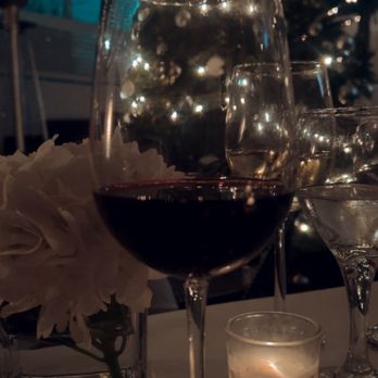 Alexanders on 30th - Christmas time outside is beautiful with movies playing on the wall - Italian Near Me - San Diego, California Alexanders on 30th - Christmas time outside is beautiful with movies playing on the wall - Italian Near Me - San Diego, California