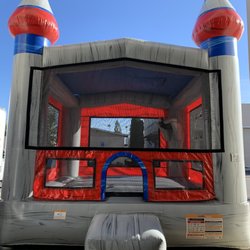 Grand Party Rentals - Titanium Castle with basket ball hoop inside