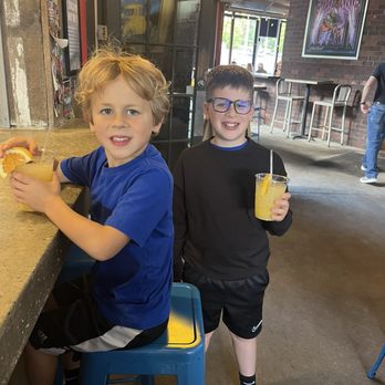 Martin's Bar-B-Que Joint - Our grandsons visiting from Boise, Idaho Enjoying a mocktail at the bar - Barbeque Near Me - Vestavia Hills, Alabama Martin's Bar-B-Que Joint - Our grandsons visiting from Boise, Idaho Enjoying a mocktail at the bar - Barbeque Near Me - Vestavia Hills, Alabama