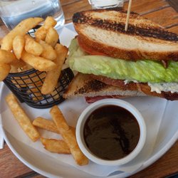 Madeline's at Jells - Chicken Club Sandwich with fries and I added in a BBQ sauce.