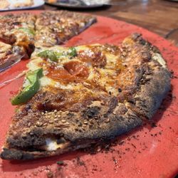 Vitorio's Pizza - Pizza quemada