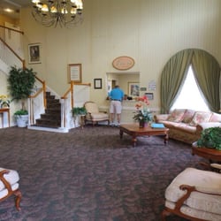 Aston Gardens At The Courtyards - Visitor checking-in to the Assisted Care Building.