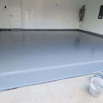 Garage Flooring 4 Ever - a garage floor being painted - Flooring Near Me Garage Flooring 4 Ever - a garage floor being painted - Flooring Near Me