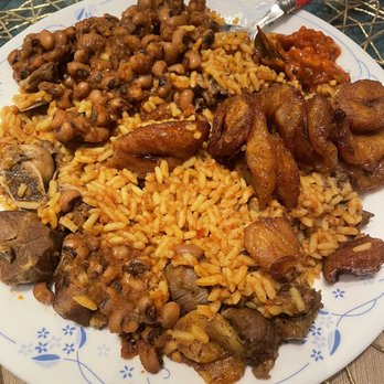 Afrodish Restaurant - Goat curry with jolof rice,plantains and beans - Caribbean Near Me - Atlanta, Georgia