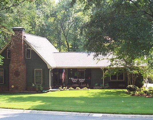 Slide of Trademark Roofing