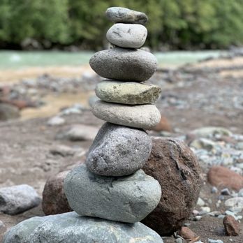 Fergie's Cafe - a stack of rocks on a beach - Cafes Near Me - Squamish, British Columbia