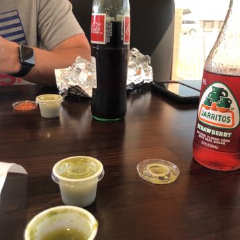 Irma's Cafe - a man sitting at a table with condiments - Coffee & Tea Near Me - Liberal, Kansas