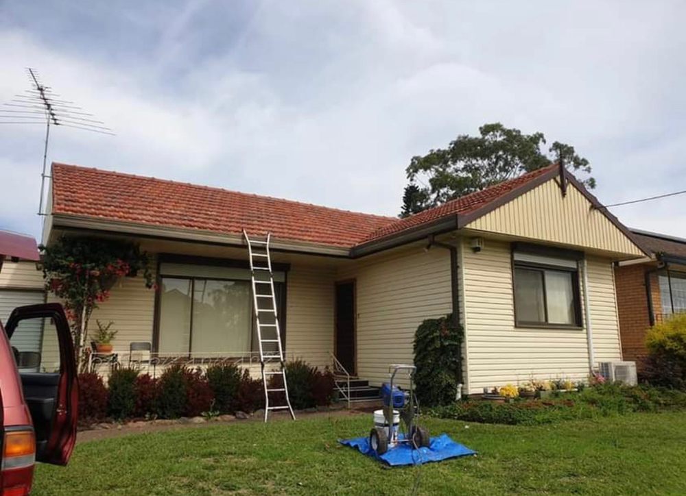 Slide of Olive Tree Roofing and Construction