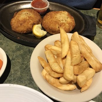 Erin Pub - The early bird special of two crab cakes and two sides for $13.95. Got fries and a side salad (not pictured) with this. - Pubs Near Me - Norwood, Pennsylvania