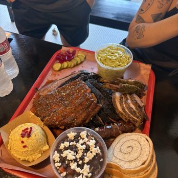 Barbs B Q - Ribs, brisket, turkey, lamb chops, sausage, charro beans (pint), potato salad (single) and green spaghetti (pint) - Barbeque Near Me - Lockhart, Texas