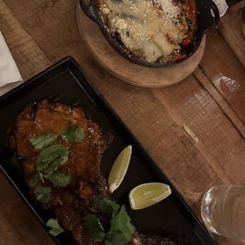 Nosh - Bone-in Pork Al Pastor Chop - New American Near Me - Rochester, New York Nosh - Bone-in Pork Al Pastor Chop - New American Near Me - Rochester, New York