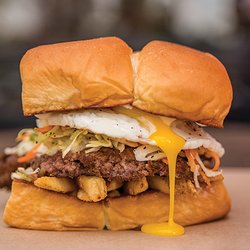 Dog Haus Biergarten - THE FREIBURGER¨ - white american cheese, fries, haus slaw, fried egg, mayo