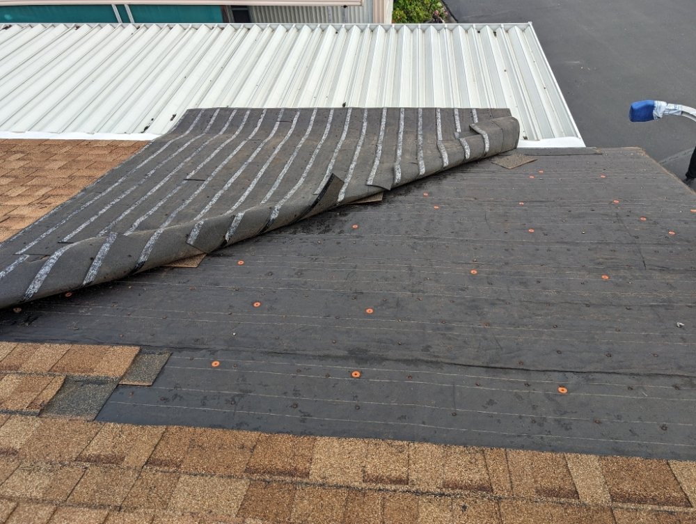 Slide of Thomas Roofing