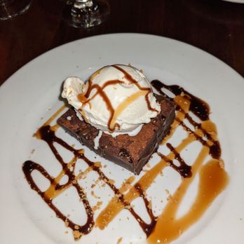 Copinette - Warm chocolate brownie with vanilla ice cream - French Near Me - New York, New York