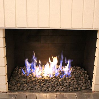 Exotic Pebbles and Glass - Exotic Black Lava Pebbles used in this indoor fireplace. - Wholesalers Near Me - Carlsbad, California Exotic Pebbles and Glass - Exotic Black Lava Pebbles used in this indoor fireplace. - Wholesalers Near Me - Carlsbad, California